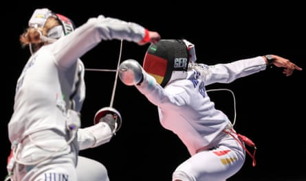 Two women fence