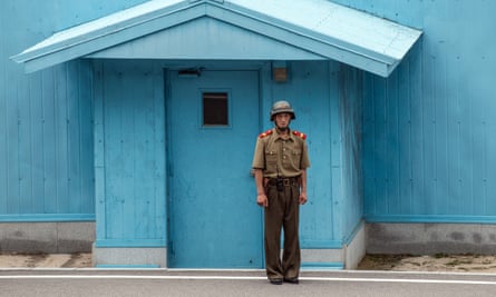 A North Korean soldier stands guard on the North Korean side of the Joint Security Area in the demilitarised Zone (DMZ).