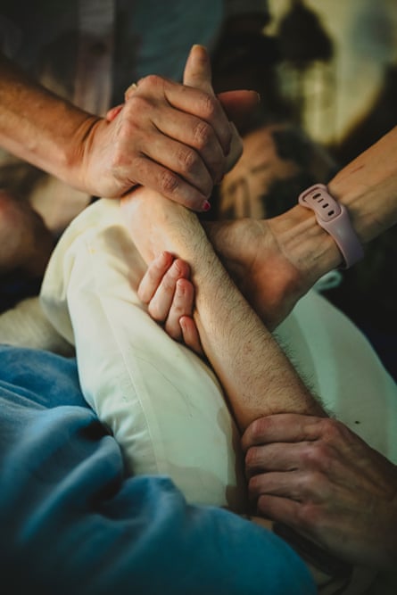Close-up view of hands stretching a hand