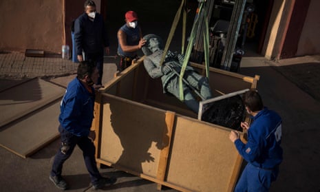 A statue of former Spanish dictator General Francisco Franco being loaded into a box