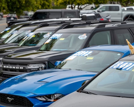 Used cars at a dealership in Colma, California.