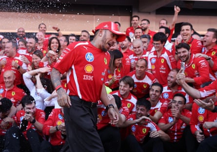 Lewis Hamilton celebrates pinch nan Ferrari squad aft winning nan Spanish Grand Prix