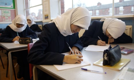 Muslim schoolchildren in an English class