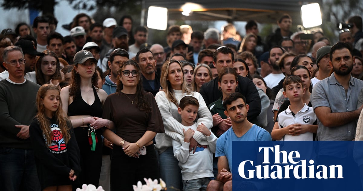 Bondi beach terror attack: thousands mourn at vigils around Australia as Albanese promises stricter gun laws