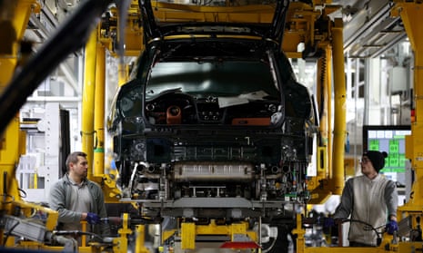 Bentley staff work on a Bentayga SUV in its factory in Crewe.
