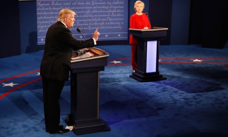 Trump speaks as Clinton listens during the debate at Hofstra University Monday.