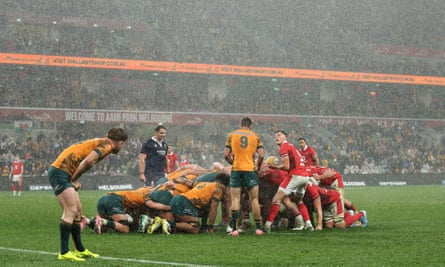 The rain pours down on a scrum at AAMI Park.