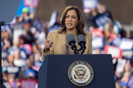 Woman at lectern on stage.