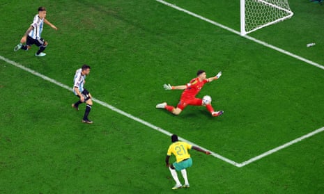 Argentina’s Emiliano Martinez in action as he saves a shot from Australia’s Garang Kuol.