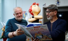 Author Jean-Yves Ferri and illustrator Didier Conrad pose with their new Asterix comic album “La Fille De Vercingetorix” (Asterix and the ChieftainÕs daughter) and a figure of the character Adrenaline during an interview in Vanves near Paris, France, October 22, 2019. The latest in the series created by illustrator Albert Uderzo and writer Rene Goscinny in 1959. Picture taken, October 22, 2019. REUTERS/Pascal Rossignol