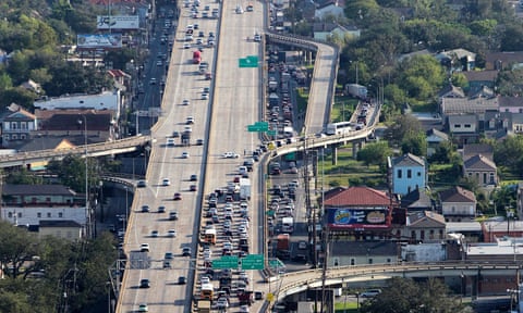 Traffic is diverted down the Esplanade Avenue exit following an accident on the elevated Interstate 10 expressway that runs above Claiborne Avenue in New Orleans. The expressway was built directly on top of Claiborne Avenue in the late 1960s – ripping up the oak trees and tearing apart a street sometimes called the ‘Main Street of Black New Orleans’.