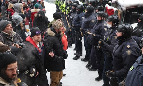 Police face off with demonstrators in Ottawa.