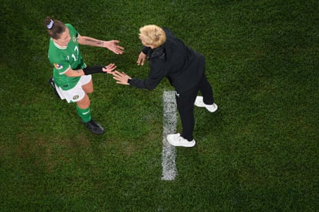 Ireland's coach Vera Pauw gestures to Ireland's midfielder #17 Sinead Farrelly as she is substituted