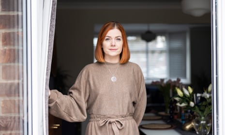 Annie Ashton standing at a window