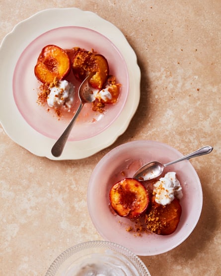 Shivi Ramoutar’s sticky roast peaches with spiced coconut cream.