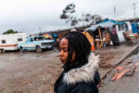 Fife stands outside a homeless encampment in Oakland in January.
