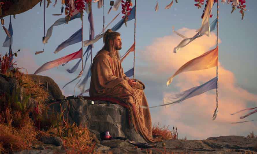 Chris Hemsworth in a robe in Thor: Love and Thunder.