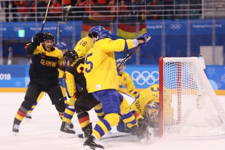 Patrick Reimer of Germany scores a goal in overtime to beat Sweden 4-3.