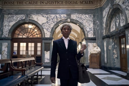 Cynthia Erivo dressed as a barrister in an empty courthouse