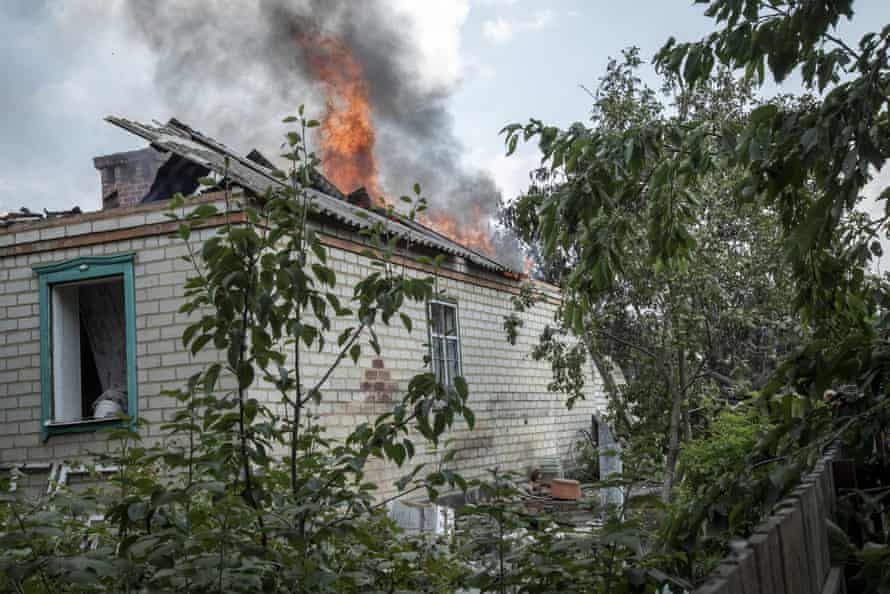 A house burns out on fire during shelling in Verkhnokamyanske frontline, Ukraine, 4 July.