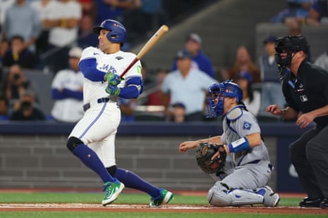 George Springer of the Blue Jays singles during the first inning.