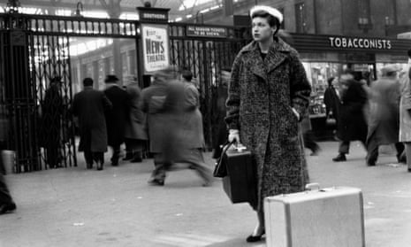 Katharine Whitehorn photographed at Waterloo railway station for the Picture Post, 1956. 
