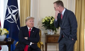 White House chief of staff Mick Mulvaney talks with US President Donald Trump at Winfield House this morning.