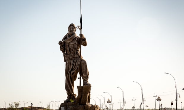A Peshmerga statue outside Kirkuk pays tribute to Kurds who fought against Isis.