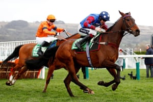 Paisley Park ridden by Aidan Coleman go past Sam Spinner ridden by Joe Colliver to win the Stayers’ Hurdle.