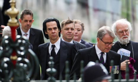 Nick Cave arrives to attend King Charles and Queen Camilla’s coronation ceremony.
