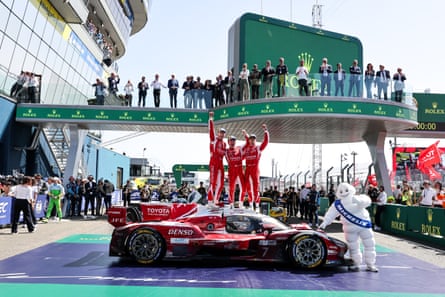Race winners Mike Conway, Kamui Kobayashi, and Nyck de Vries celebrate their victory