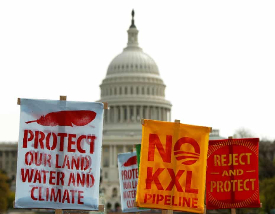 Activists protest against the Keystone XL pipeline in front of the US Capitol in Washington 22 April 2014. There has been an uptick in civil disobedience and direct actions challenging fossil fuel infrastructure projects.