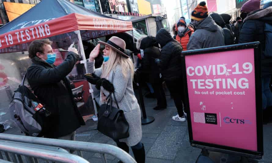 New Yorkers wait in line to get tested in Times Square.