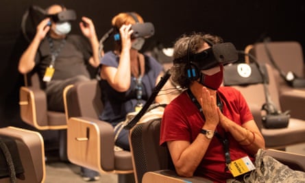 People experience the virtual reality of Symphony.