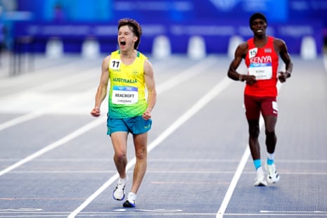 Isaac Beacroft celebrates winning the men’s 10,000m race walk.