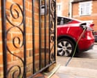 ‘I can charge my car for £6’: could new rules cut costs for EV drivers?