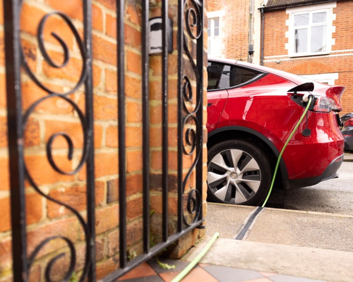 ‘I can charge my car for £6’: could new rules cut costs for EV drivers?