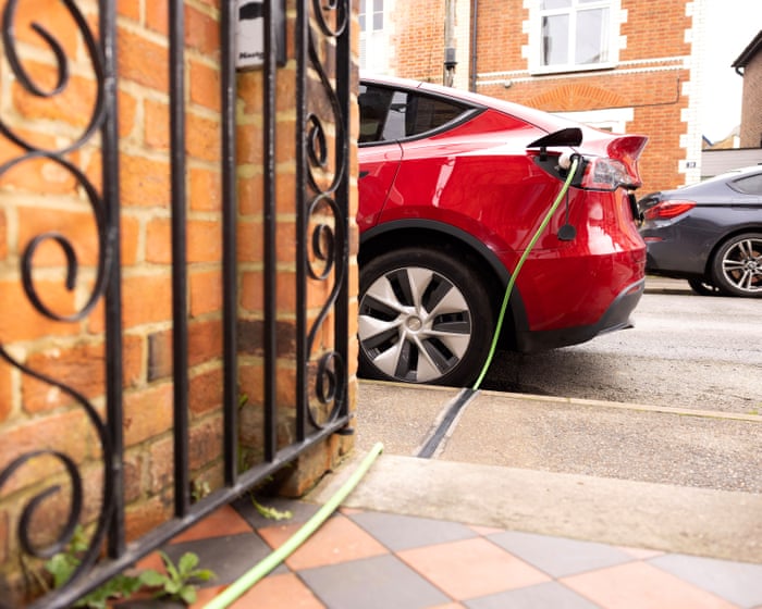 ‘I can charge my car for £6’: could new rules cut costs for EV drivers?
