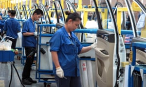 FILE PHOTO - Employees work at a production line inside a factory of Saic GM Wuling, in Liuzhou, Guangxi Zhuang Autonomous Region, China, June 19, 2016. REUTERS/Norihiko Shirouzu/File Photo GLOBAL BUSINESS WEEK AHEAD SEARCH GLOBAL BUSINESS 14 AUG FOR ALL IMAGES