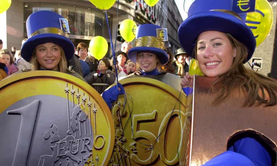 Women dressed as euro coins in central Dublin on 31 December 2001, the day before the euro became legal tender.