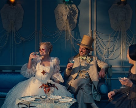 Margot Robbie as Cathy and Shazad Latif as Edgar in a scene from Wuthering Heights.