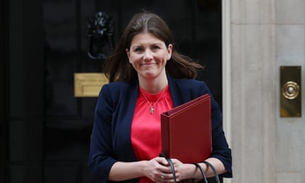 Michelle Doelan smiling for the cameras as she walks out of 10 Downing Street