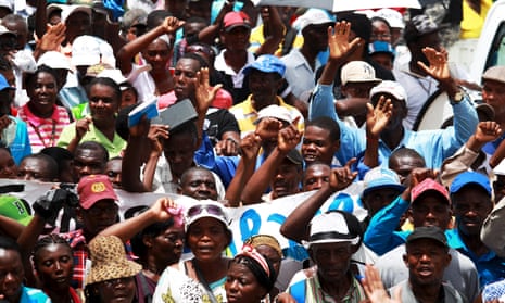 Hundreds of Haitians participate in a march in Santo Domingo in 2015 against a new migration law. The Dominican Repubic has a history of anti-Haitian racism.