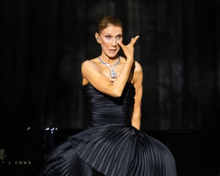 Dion wipes away tears at her first comeback show.