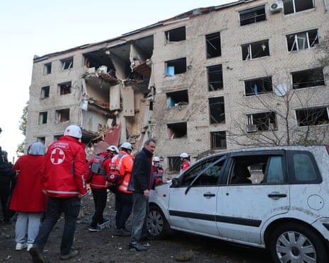 Rescuers search for survivors after a Russian missile hit a hostel in Zaporizhzhia, Ukraine.