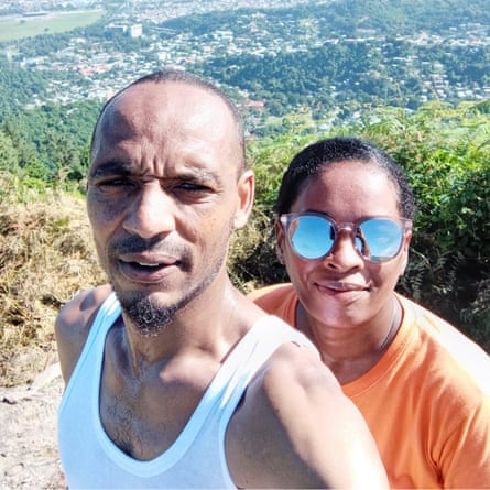 Mark on the left, Raquel just behind him with sunglasses, countryside in the background