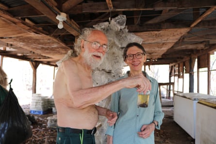 Daniel Janzen and Winnie Hallwachs in an outhouse filled with samples near their cabin in the ACG. Janzen is holding a jar of frozen insects that will be DNA barcoded in Canada.