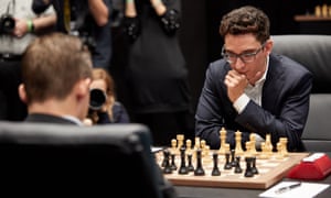 Magnus Carlsen Forced To Hold On For Game 2 Draw With Fabiano Caruana As It Happened Sport The Guardian