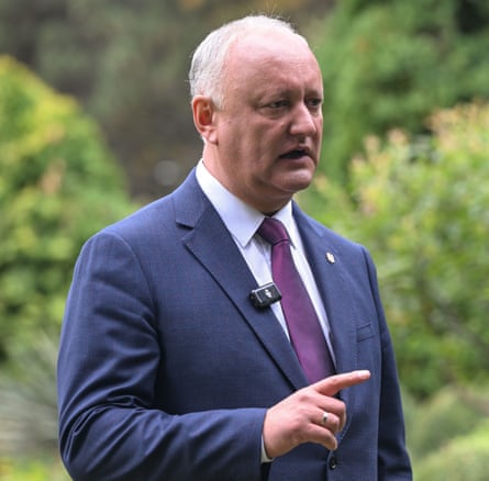 Igor Dodon in a suit speaking to the press