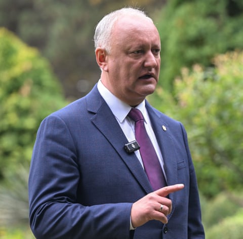 Igor Dodon in a suit speaking to the press